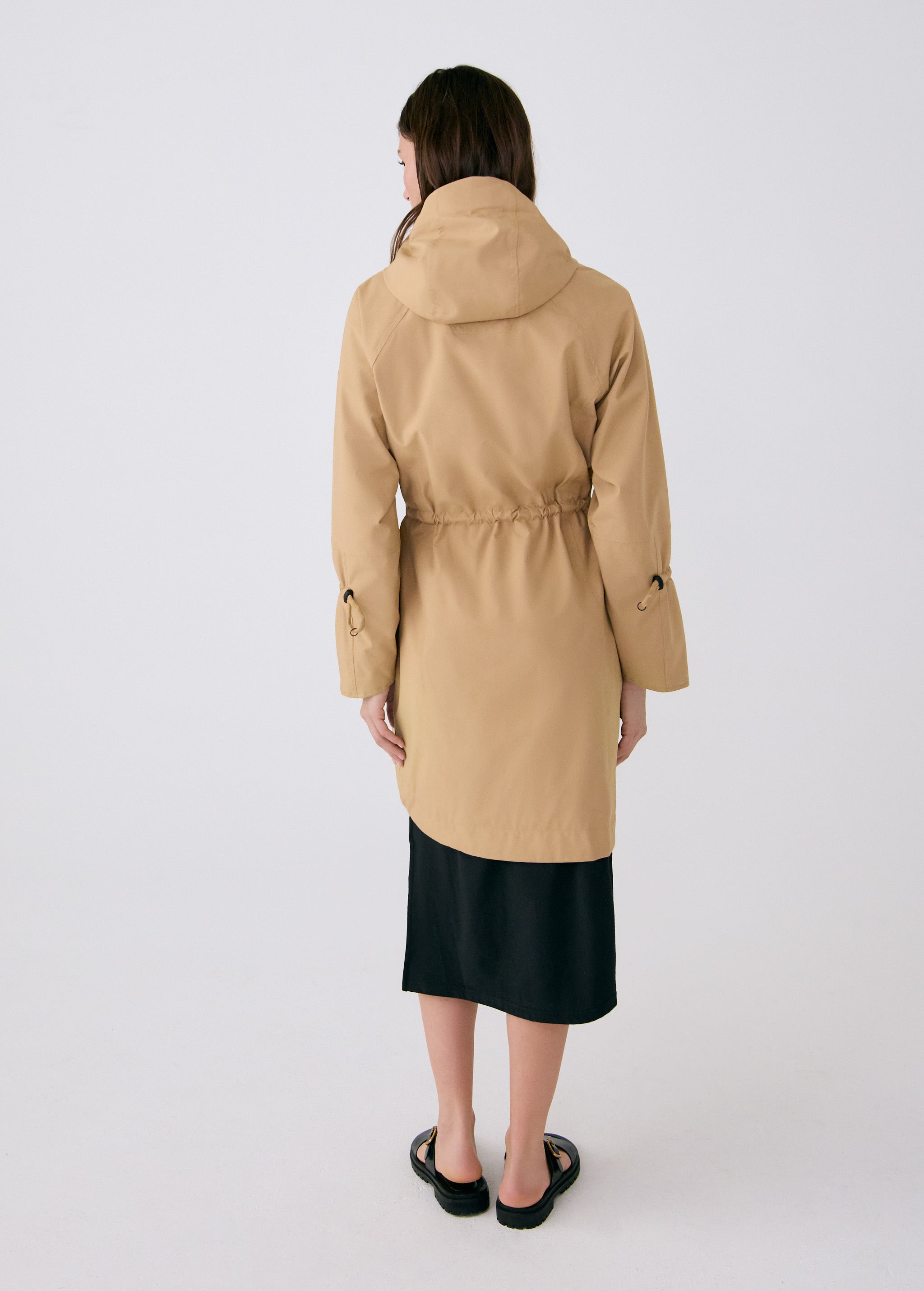 Lolë Piper Oversized Rain Jacket in Carmel tan — for a more streamlined fit, consider sizing down