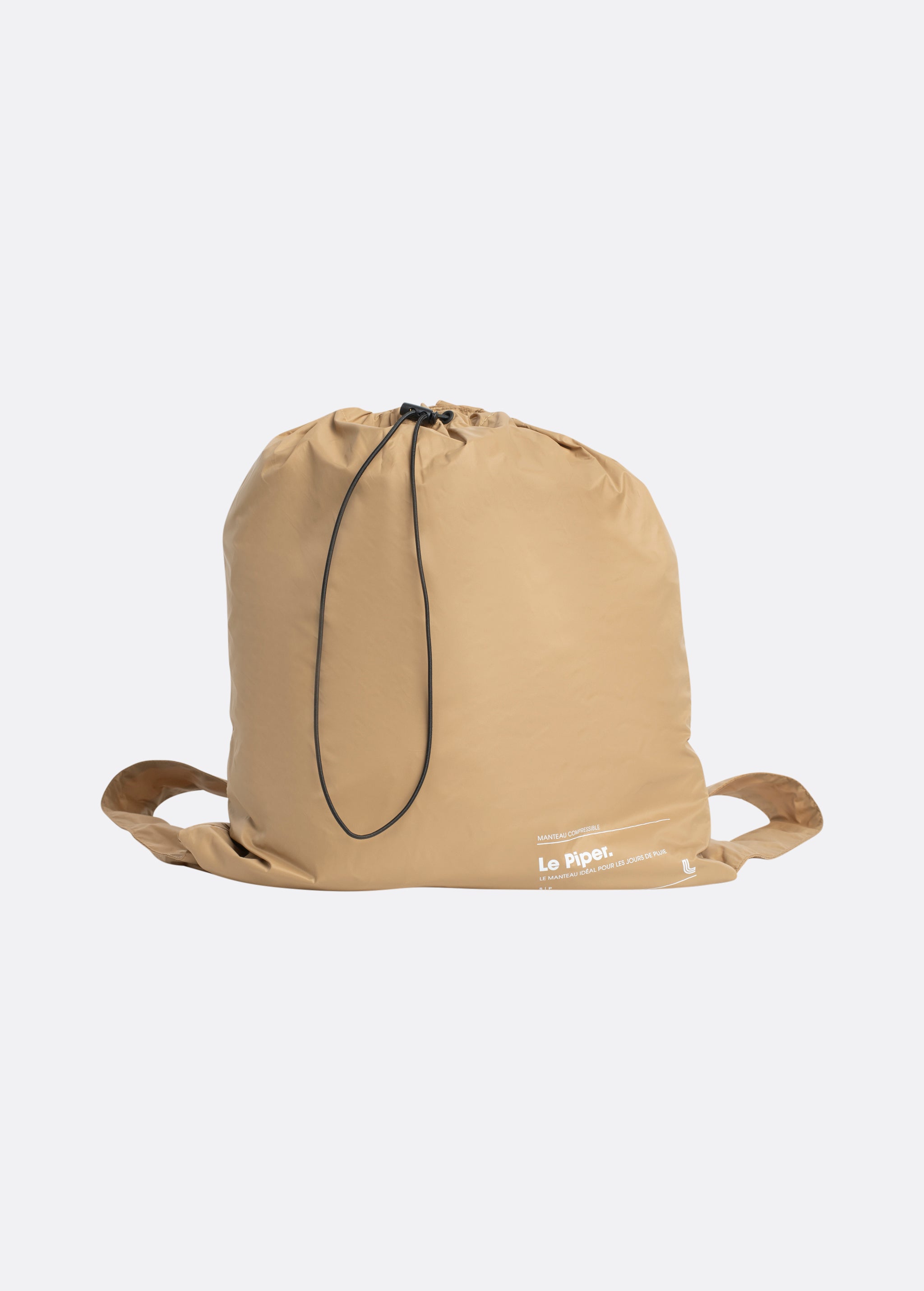Lolë Piper Oversized Rain Jacket in Carmel tan — for a more streamlined fit, consider sizing down