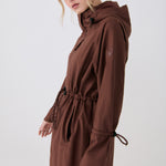 Lolë Piper Oversized Rain Jacket in Sienna brown — for a more streamlined fit, consider sizing down