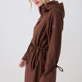 Lolë Piper Oversized Rain Jacket in Sienna brown — for a more streamlined fit, consider sizing down