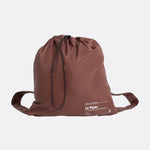 Lolë Piper Oversized Rain Jacket in Sienna brown — for a more streamlined fit, consider sizing down