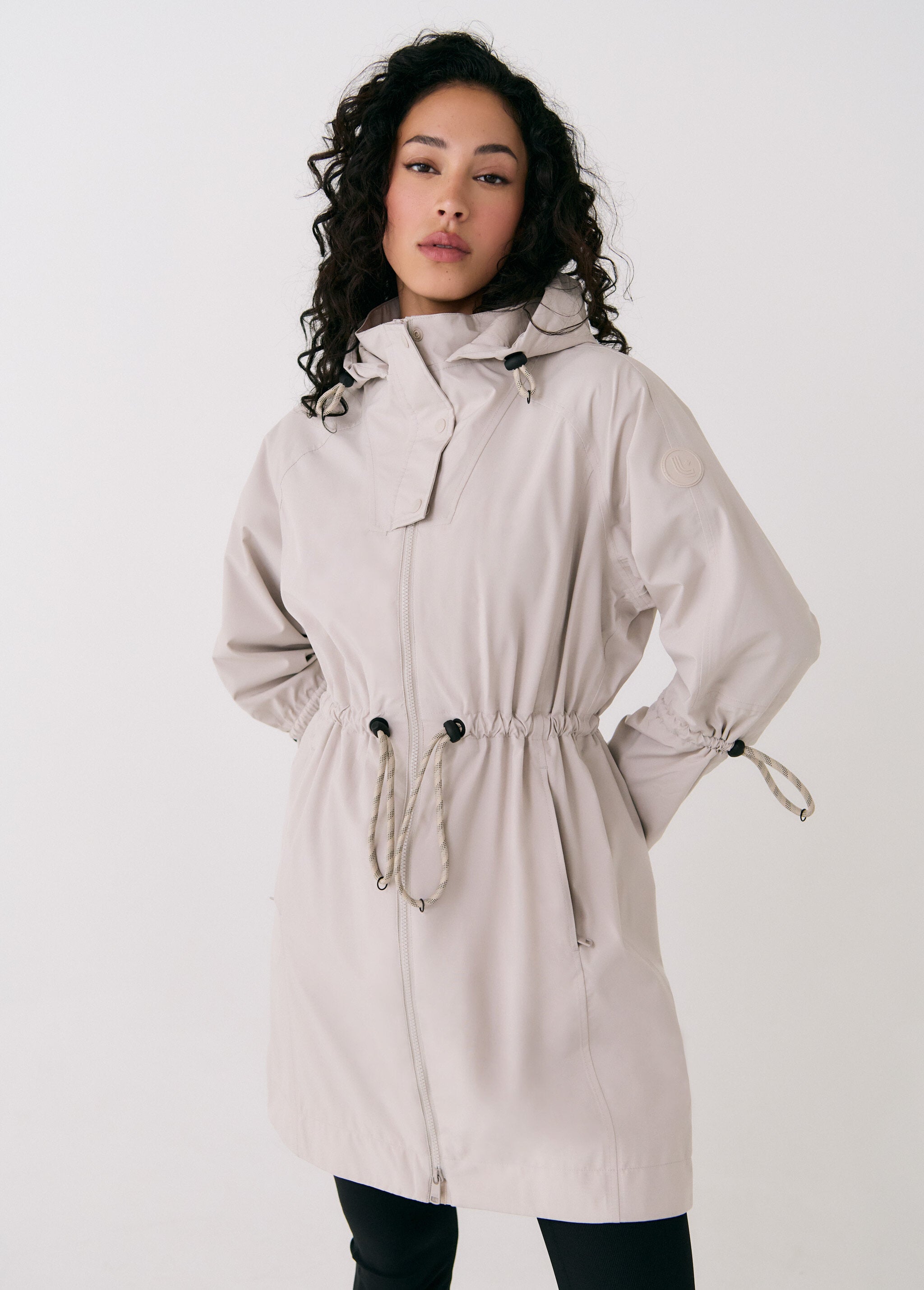 Lolë Piper Oversized Rain Jacket in Abalone pale greige — for a more streamlined fit, consider sizing down