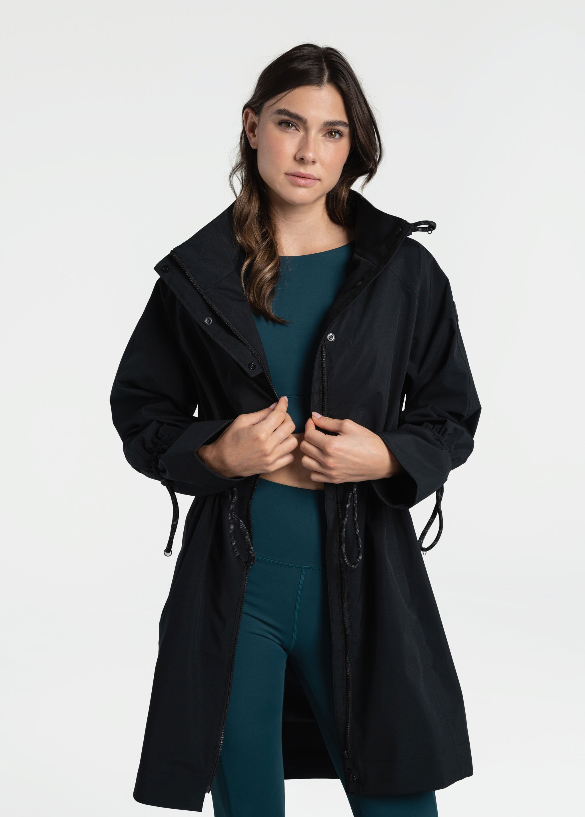 Lolë Piper Oversized Rain Jacket in black — for a more streamlined fit, consider sizing down