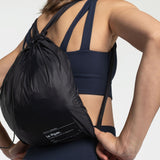 Lolë Piper Oversized Rain Jacket in black — for a more streamlined fit, consider sizing down