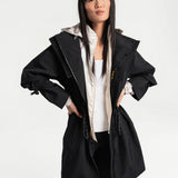 Lolë Piper Oversized Rain Jacket in black — for a more streamlined fit, consider sizing down