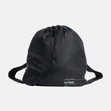 Lolë Piper Oversized Rain Jacket in black — for a more streamlined fit, consider sizing down