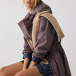 Lolë Piper Oversized Rain Jacket in Twilight mauve taupe — for a more streamlined fit, consider sizing down