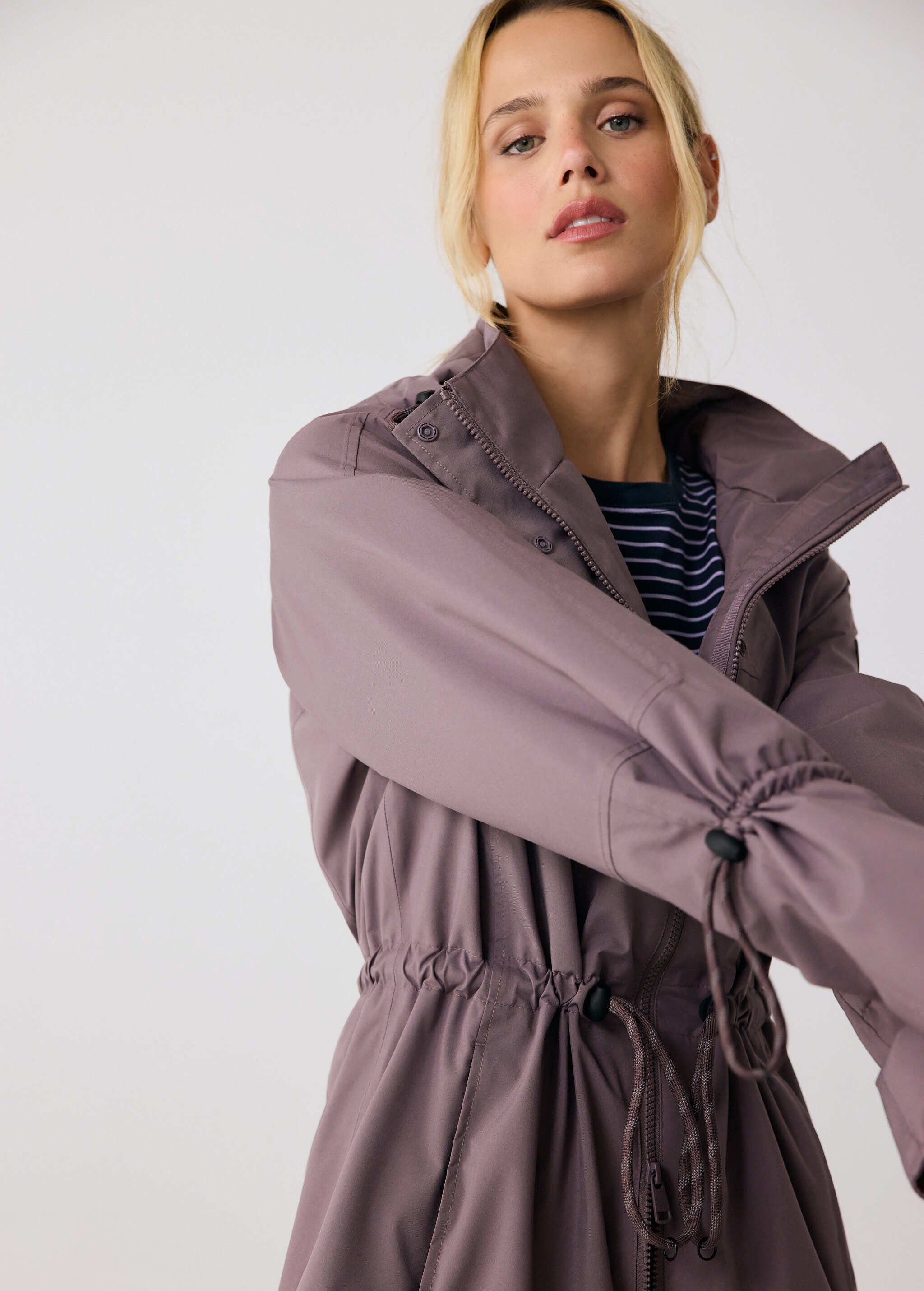 Lolë Piper Oversized Rain Jacket in Twilight mauve taupe — for a more streamlined fit, consider sizing down