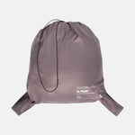 Lolë Piper Oversized Rain Jacket in Twilight mauve taupe — for a more streamlined fit, consider sizing down