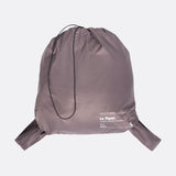 Lolë Piper Oversized Rain Jacket in Twilight mauve taupe — for a more streamlined fit, consider sizing down