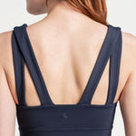 Lolë Step Up Bra in Outerspace navy — this high-support longline sports bra sets you in motion