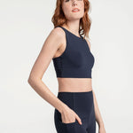 Lolë Step Up Bra in Outerspace navy — this high-support longline sports bra sets you in motion