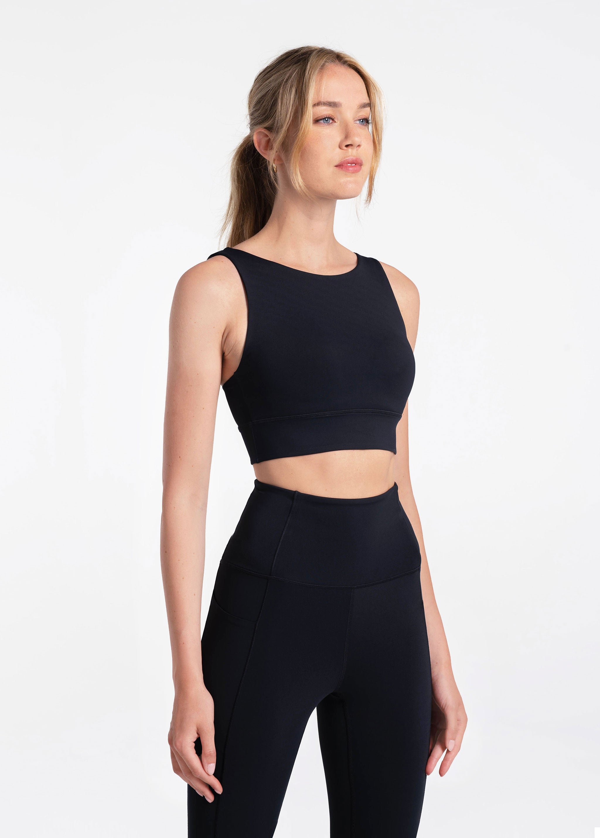 Lolë Step Up Bra in black — this high-support longline sports bra sets you in motion