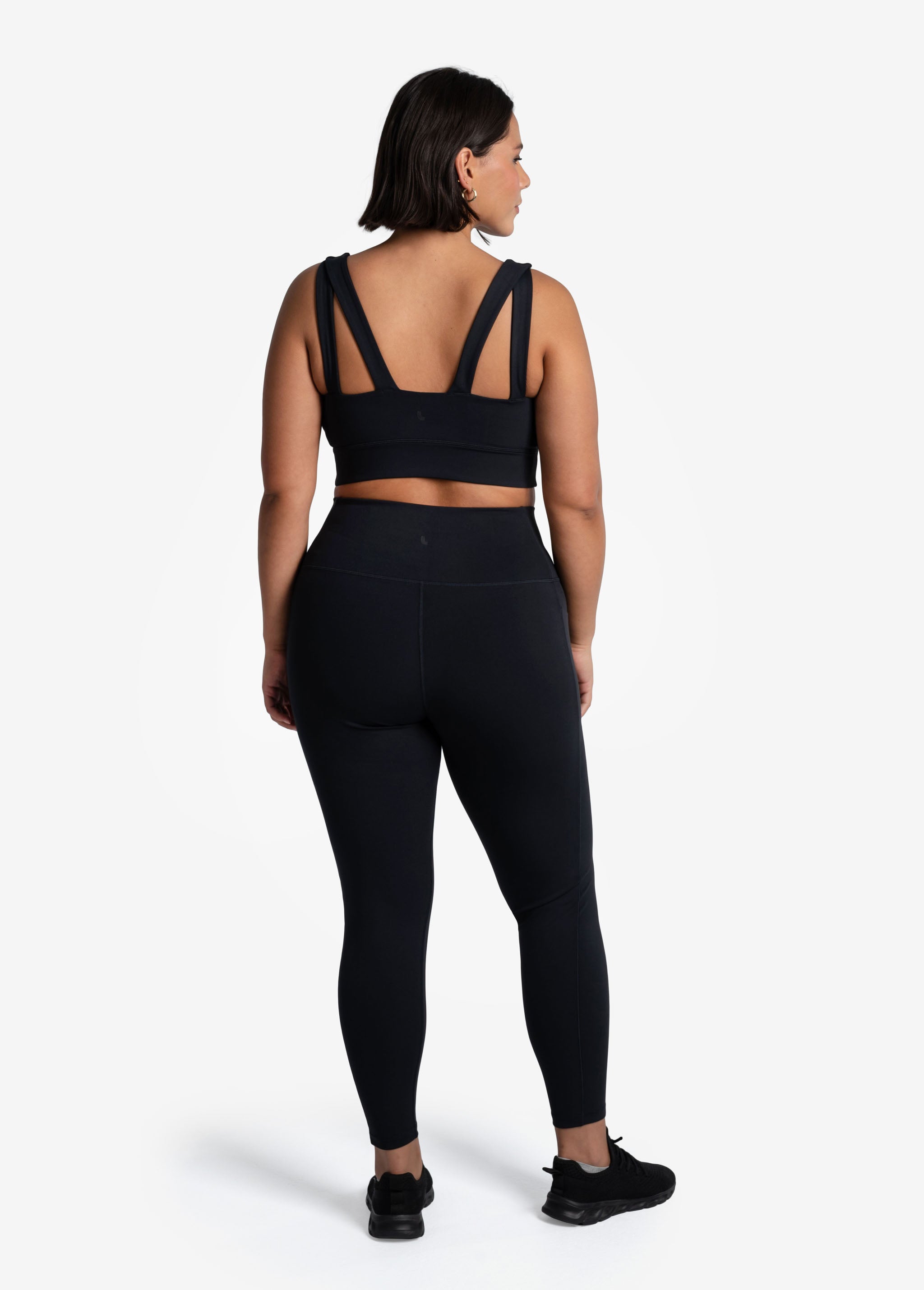 Lolë Step Up Bra in black — this high-support longline sports bra sets you in motion