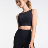 Lolë Step Up Bra in black — this high-support longline sports bra sets you in motion