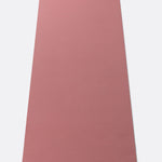Lolë Pose yoga mat in dusty rose, unrolled flat showing the smooth dusty-rose top surface and yellow logo tab
