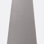 Lolë Pose yoga mat in grey, unrolled flat showing the textured grey underside with the Lolë logo tab