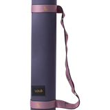 Lolë Pose yoga mat in navy, rolled upright showing the navy outer side with the mauve-pink carry strap
