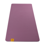 Lolë Pose yoga mat in orchid purple, unrolled flat showing the smooth orchid-purple top and small logo tab