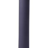 Lolë Pose yoga mat in navy, rolled and standing upright showing the herringbone-textured navy outer surface