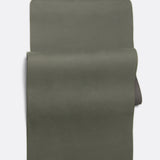 Lolë Pose yoga mat in olive green, unrolled flat showing the olive top and charcoal underside at the roll edge