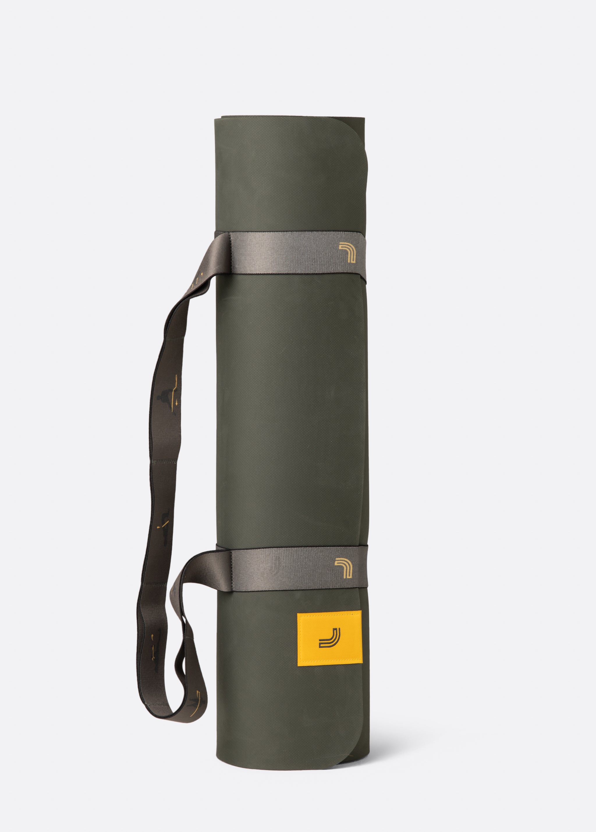 Lolë Pose yoga mat in olive green, rolled and held by the taupe strap ready to carry