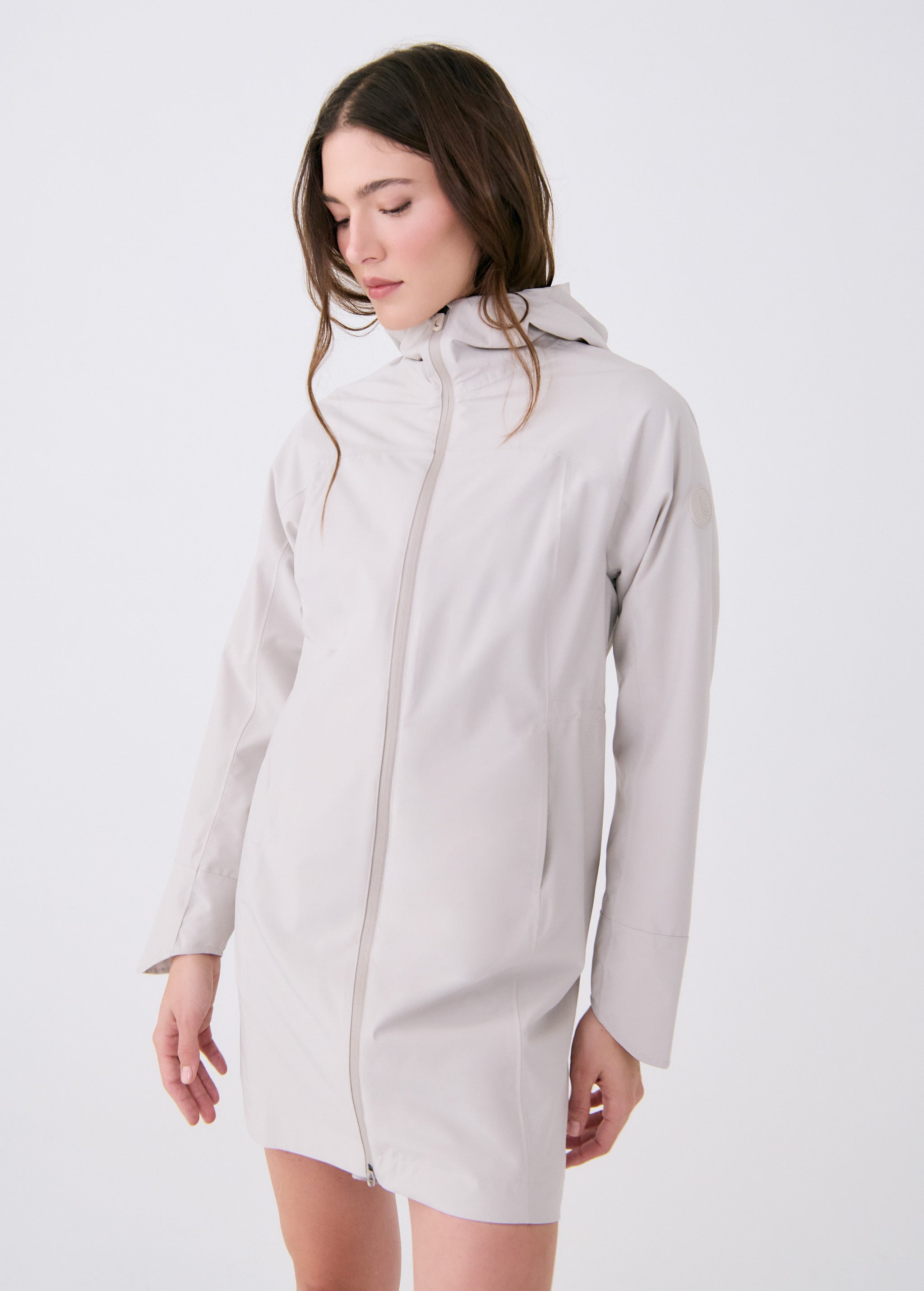 Lolë Element Long Rain Jacket in Abalone pale greige — shake off wet weather with this longline rain jacket