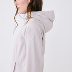 Lolë Element Long Rain Jacket in Abalone pale greige — shake off wet weather with this longline rain jacket
