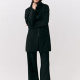 Lolë Element Long Rain Jacket in black — shake off wet weather with this longline rain jacket