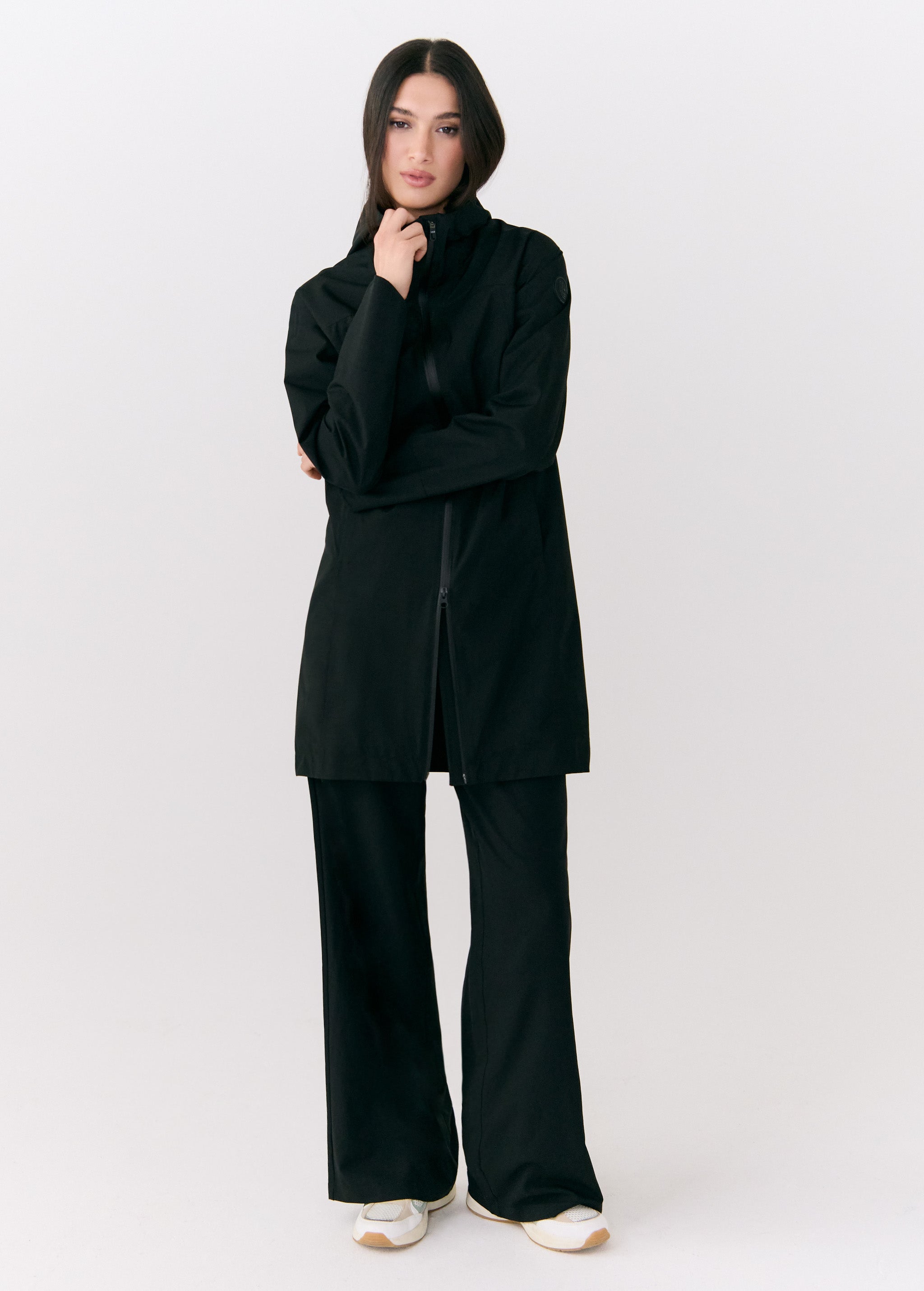 Lolë Element Long Rain Jacket in black — shake off wet weather with this longline rain jacket