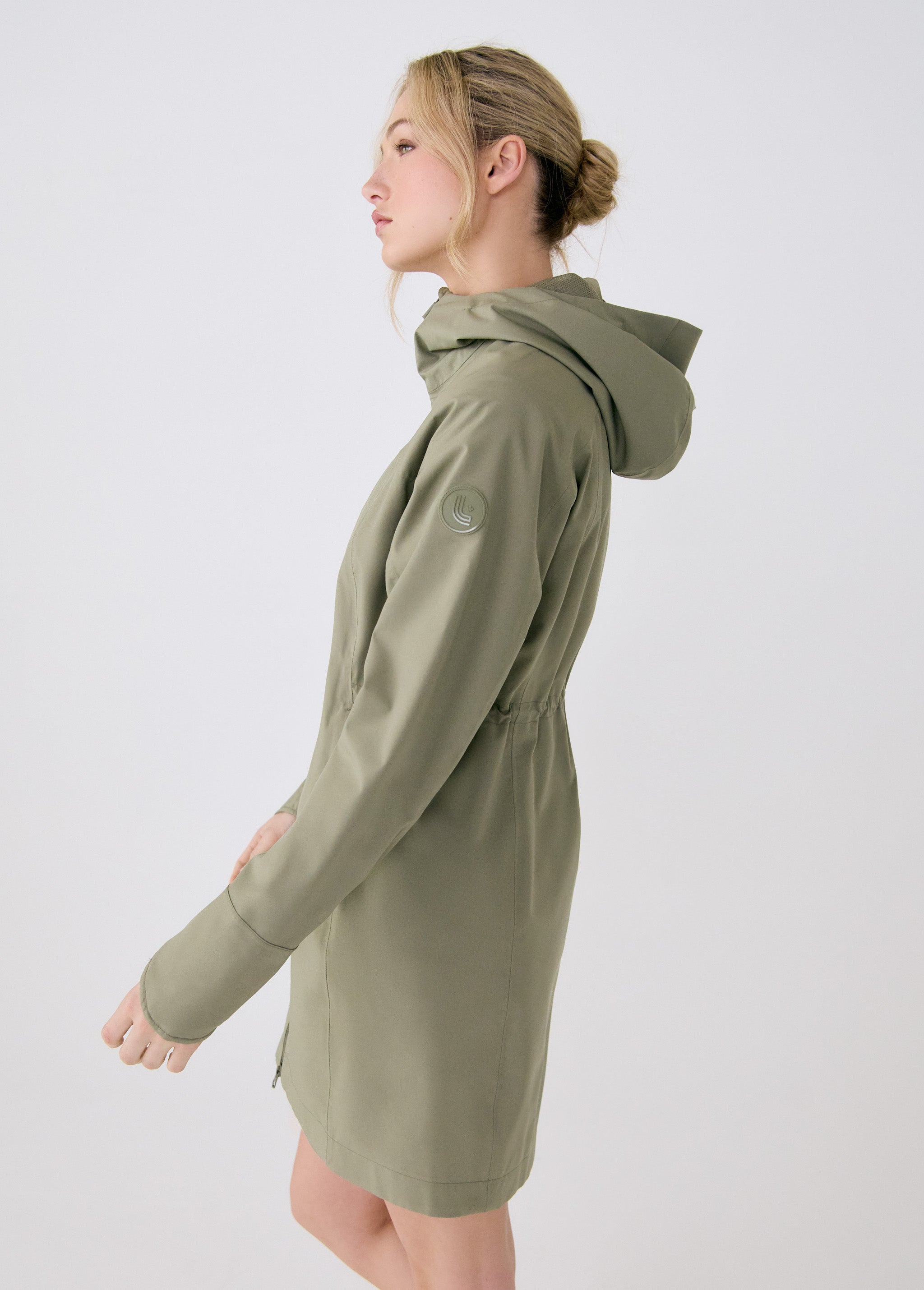 Lolë Element Long Rain Jacket in Hazel sage green — shake off wet weather with this longline rain jacket