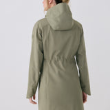 Lolë Element Long Rain Jacket in Hazel sage green — shake off wet weather with this longline rain jacket