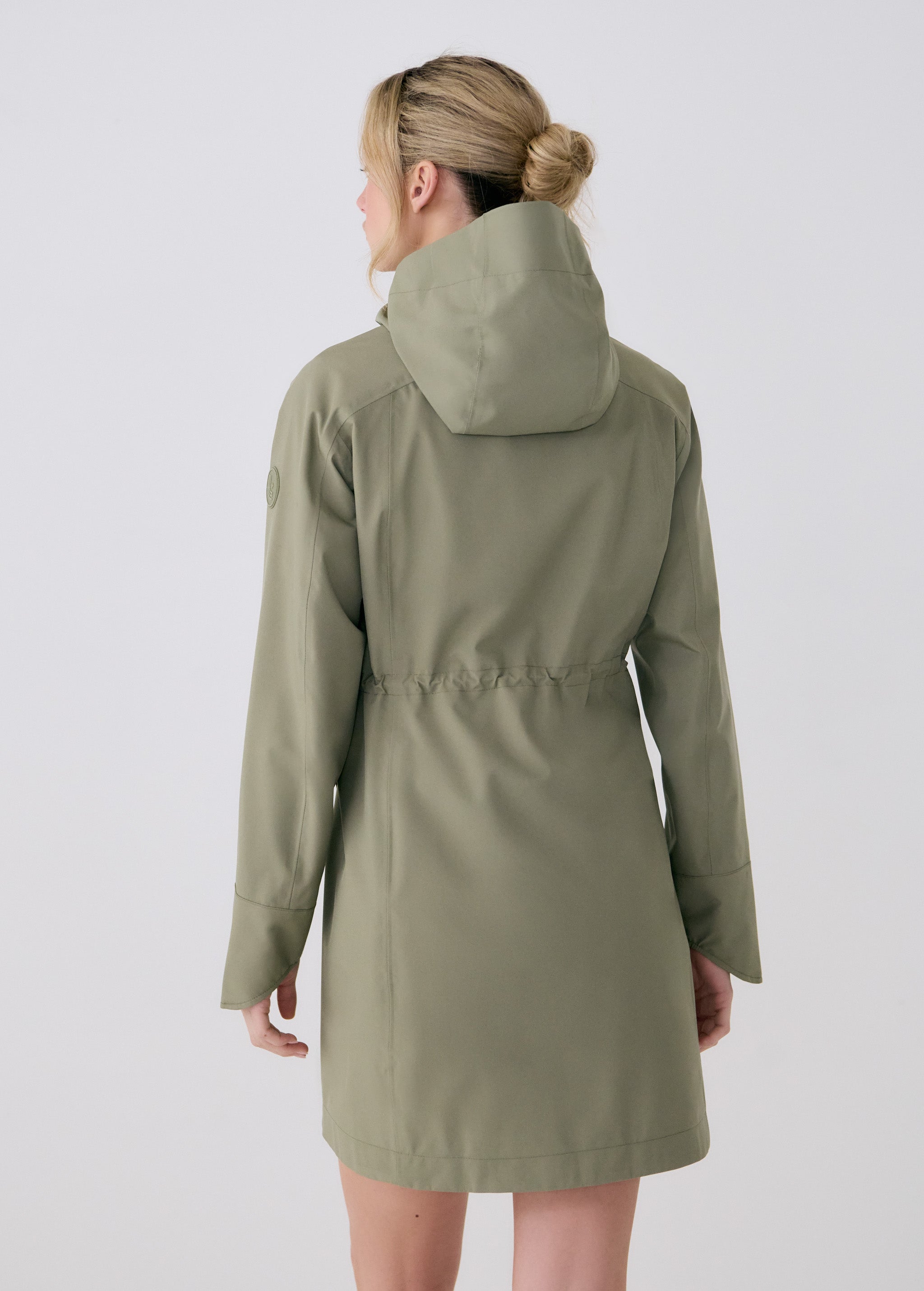 Lolë Element Long Rain Jacket in Hazel sage green — shake off wet weather with this longline rain jacket