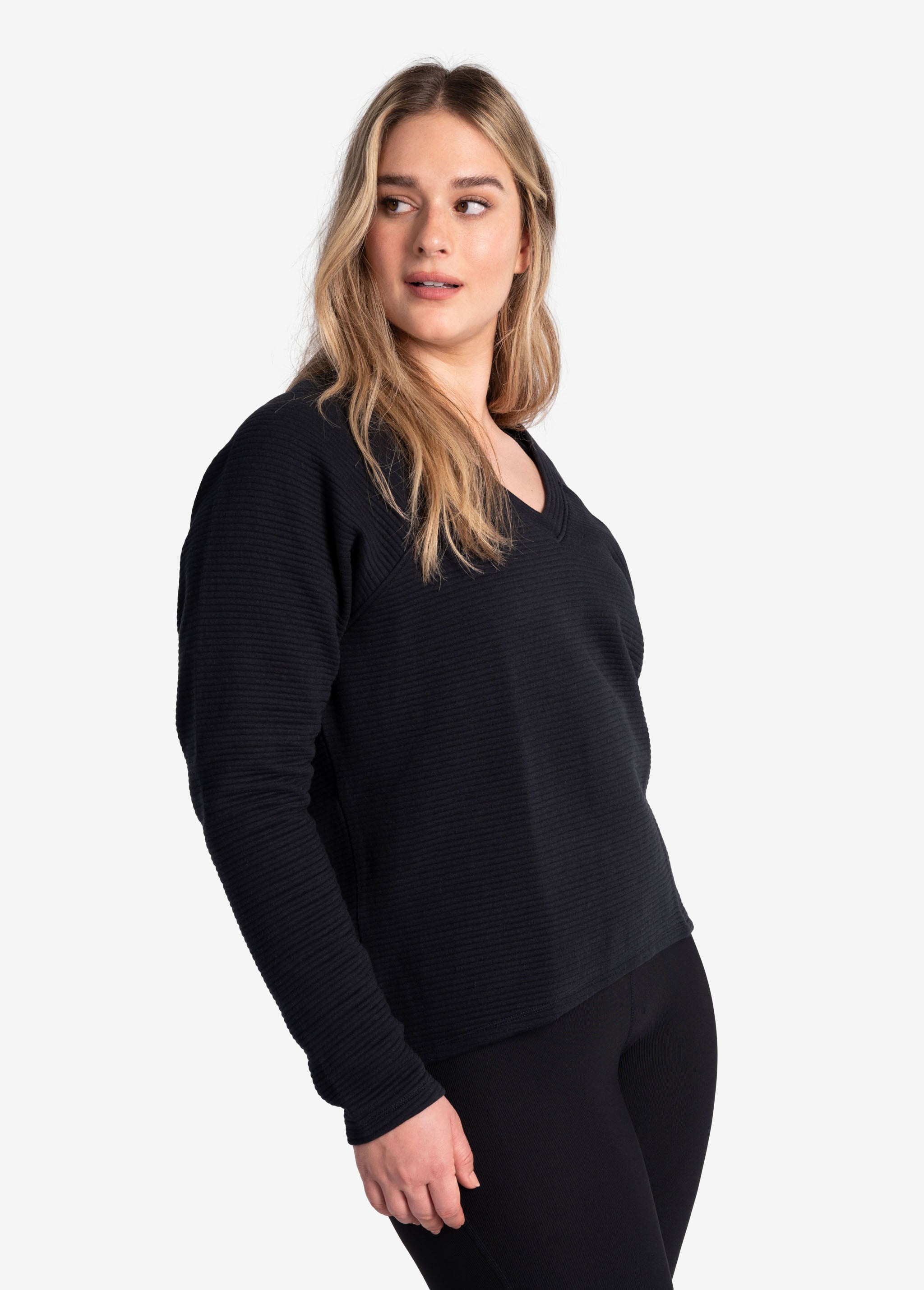 Lolë Ottoman V-Neck Pullover in black — a modern take on a classic pullover you can dress up or down